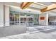Building entrance featuring automatic doors, sleek railings, and a clear view of the interior at 1777 Larimer St # 2201, Denver, CO 80202