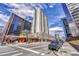City high rise building featuring a modern design with lots of windows, surrounded by a sunny sky at 1777 Larimer St # 2201, Denver, CO 80202