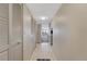 Hallway leading to a bright living area with expansive city views at 1777 Larimer St # 2201, Denver, CO 80202