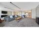 Open-concept living space seamlessly connecting the living area, dining area, and kitchen at 1777 Larimer St # 2201, Denver, CO 80202