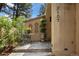 Cozy entrance with decorative ironwork, potted plants, and a charming seating area at 2107 Ridge Plaza Dr, Castle Rock, CO 80108