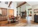 Cozy living room with a custom fireplace and hardwood floors at 2107 Ridge Plaza Dr, Castle Rock, CO 80108