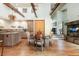 Open floor plan with direct access to the kitchen and living room, all with hardwood floors at 2107 Ridge Plaza Dr, Castle Rock, CO 80108