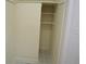 Hallway closet with shelves and tile floor at 1300 Spruce St, Denver, CO 80220