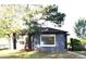 Charming single-story home with a brick exterior, well-maintained landscaping, and bright window trim at 1300 Spruce St, Denver, CO 80220
