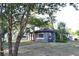Single-story home with a brick exterior, neat landscaping, and a quaint walkway leading to the front door at 1300 Spruce St, Denver, CO 80220