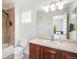 Functional bathroom with a single vanity, shower-tub combo, and neutral finishes providing a clean and practical space at 22002 E Irish Dr, Aurora, CO 80016