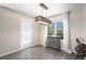 Dining area featuring hardwood floors, stylish lighting, and access to the back yard at 22002 E Irish Dr, Aurora, CO 80016