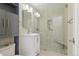 Modern bathroom featuring beautiful tiled shower and new vanity at 320 S Ames St # 5, Lakewood, CO 80226