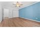 Comfortable bedroom featuring wood flooring and a closet at 320 S Ames St # 5, Lakewood, CO 80226