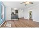 Open floor plan with updated kitchen, stainless steel appliances and adjacent dining area at 320 S Ames St # 5, Lakewood, CO 80226