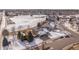 Beautiful home and neighborhood as seen from above near a large pond, showcasing the property's prime location at 751 Wyndemere Dr, Longmont, CO 80504