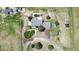Bird's-eye view of the property, displaying the home, detached garage, surrounding land, and ample parking space at 45321 Summit Rd, Parker, CO 80138