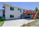 Back of home with deck and large patio at 45321 Summit Rd, Parker, CO 80138