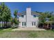 Back of home with large yard and deck at 45321 Summit Rd, Parker, CO 80138