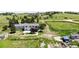 Sprawling backyard with mature trees, a trampoline and deck perfect for outdoor entertaining at 45321 Summit Rd, Parker, CO 80138