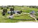 A large lot featuring a house with fenced in backyard and outbuildings at 45321 Summit Rd, Parker, CO 80138