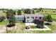 A backyard featuring a deck, patio and trampoline at 45321 Summit Rd, Parker, CO 80138