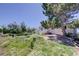 Charming home featuring a white-painted porch and a yard adorned with wildflowers at 45321 Summit Rd, Parker, CO 80138