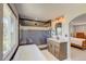A bright bathroom featuring a tub, standalone shower, and marble countertop vanity at 45321 Summit Rd, Parker, CO 80138
