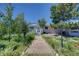 Inviting home with stone walkway and well-manicured landscaping at 45321 Summit Rd, Parker, CO 80138