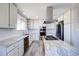 Modern kitchen featuring an island, stainless steel appliances, and plenty of counter space at 45321 Summit Rd, Parker, CO 80138