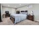 Finished basement bedroom featuring a comfortable bed and carpet floors at 2974 S Parker Ct, Aurora, CO 80014