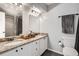 Bathroom with granite countertops and double sinks at 2974 S Parker Ct, Aurora, CO 80014