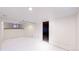 Unfinished basement with painted white walls and floors at 588 S Grant St, Denver, CO 80209