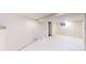 Unfinished basement with painted white walls and floors at 588 S Grant St, Denver, CO 80209
