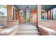 Inviting front entrance with brick steps, detailed stonework, and an open doorway at 588 S Grant St, Denver, CO 80209