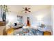 Comfortable living room featuring a cozy sofa, area rug, and natural light at 588 S Grant St, Denver, CO 80209