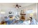 Bright living room showcases a fireplace, hardwood floors, and views of the dining area at 588 S Grant St, Denver, CO 80209