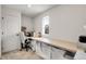 Bright home office with custom desk and ample storage at 4358 S Nepal Ct, Centennial, CO 80015