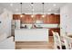 Modern kitchen with stainless steel appliances, granite countertops, and a large island at 4358 S Nepal Ct, Centennial, CO 80015