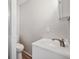 Functional bathroom with a white vanity, silver fixtures, and a clean, minimalist design at 1934 Macon St, Aurora, CO 80010