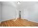 Bedroom featuring light-filled room, hardwood floors, and neutral walls at 1934 Macon St, Aurora, CO 80010