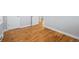 The hallway features hardwood floors and white trim at 1934 Macon St, Aurora, CO 80010