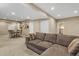 Spacious living room with plush seating and dining area; perfect for hosting gatherings at 30 Stewart Way, Erie, CO 80516