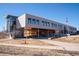 Exterior view of Red Hawk Elementary School, showing architectural details and the surrounding landscape at 30 Stewart Way, Erie, CO 80516