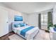 Comfortable bedroom with ample natural light and neutral tones, calming decor at 922 S Walden Street St # 103, Aurora, CO 80017