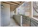 View of an outdoor patio with railing and access to the building at 922 S Walden Street St # 103, Aurora, CO 80017