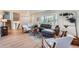 Cozy living room featuring comfortable seating, a large window and modern decor with lots of natural light at 5855 Rustic Knolls Dr, Boulder, CO 80301