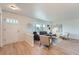 Inviting living room with modern decor, ample natural light, and stylish furnishings on wood floors at 5855 Rustic Knolls Dr, Boulder, CO 80301