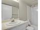 Bathroom featuring a combined shower and tub at 3844 S Gibralter St, Aurora, CO 80013