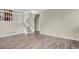 Bright living room showcasing hardwood floors and a staircase at 3844 S Gibralter St, Aurora, CO 80013