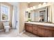 Clean bathroom with a shower/tub combo and vanity at 10443 Skyreach Way, Highlands Ranch, CO 80126