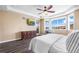 Main bedroom with a sitting area and access to a balcony at 10443 Skyreach Way, Highlands Ranch, CO 80126