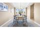 Formal dining room with a table and chairs, featuring natural light at 10443 Skyreach Way, Highlands Ranch, CO 80126