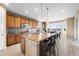 Kitchen with granite island, stainless steel appliances, and mountain views at 10443 Skyreach Way, Highlands Ranch, CO 80126